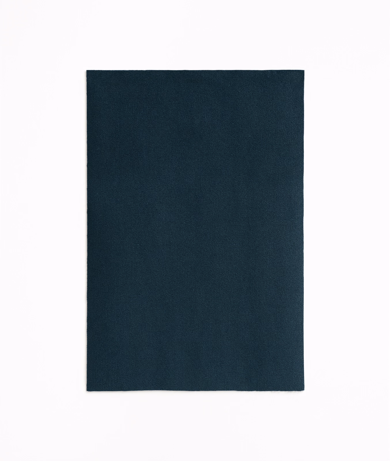 Deep blue-teal velvet swatch with a subtly shifting nap and near-black tonal depth