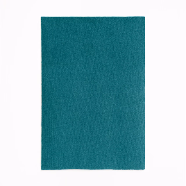 Deep ocean teal velvet with a low, softly brushed nap and subtle tonal depth