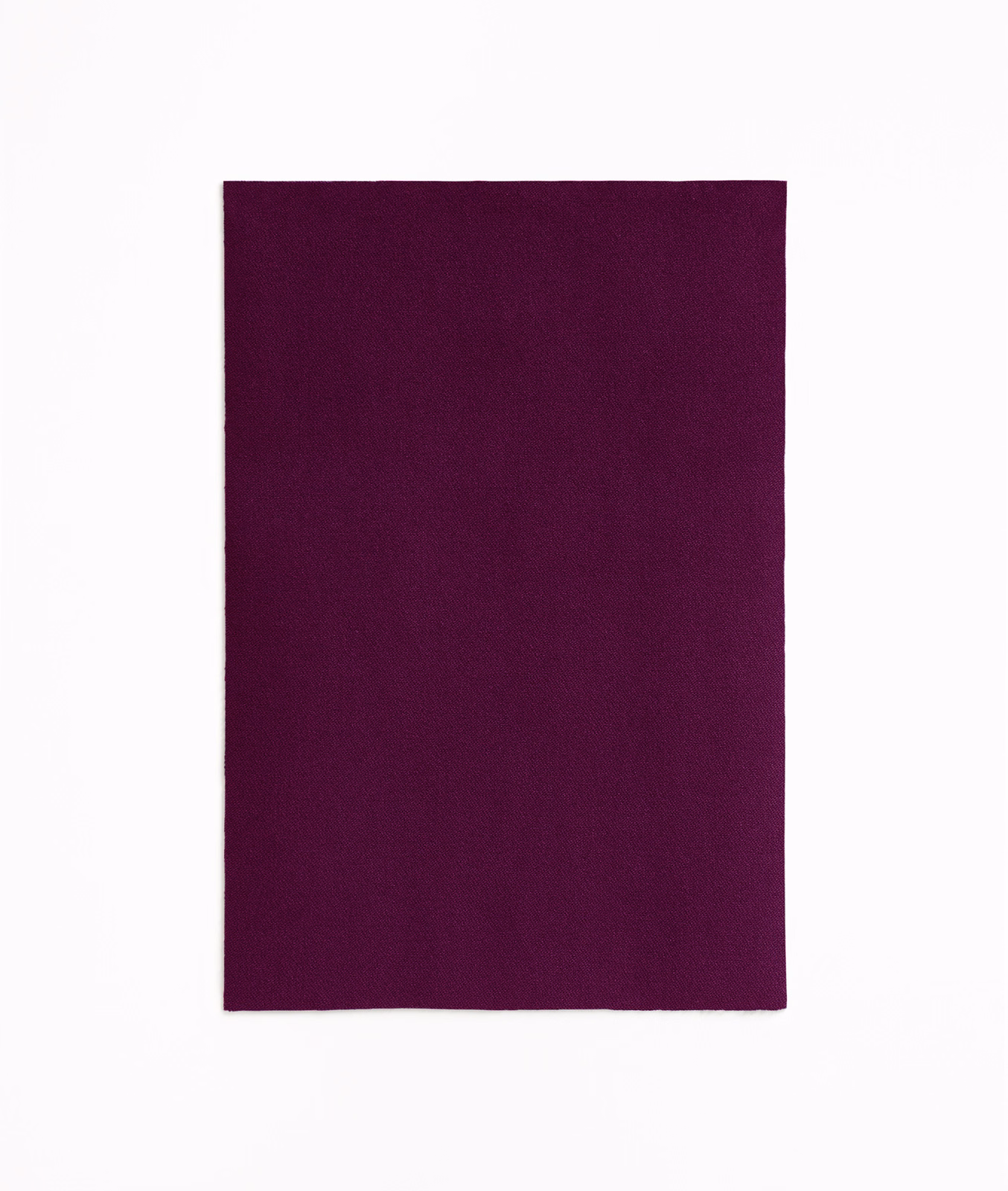 Deep plum-purple velvet swatch showing a soft, subtly directional pile