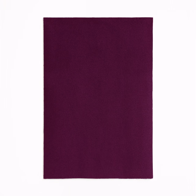 Deep plum-purple velvet swatch showing a soft, subtly directional pile