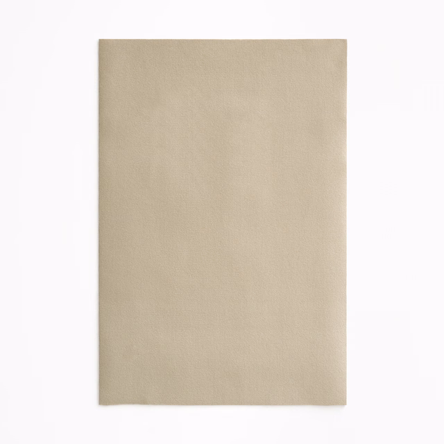 Pale stone-taupe velvet swatch with a soft nap and subtle directional shading