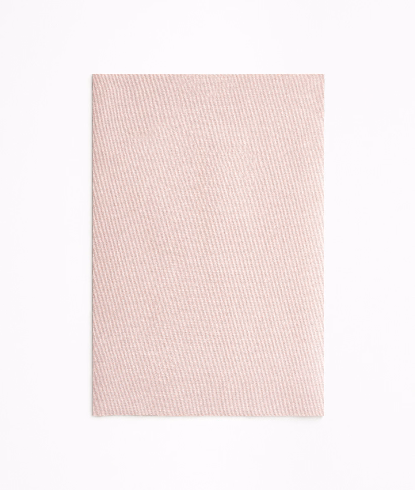 Soft blush pink velvet swatch showing a smooth, subtly shaded nap