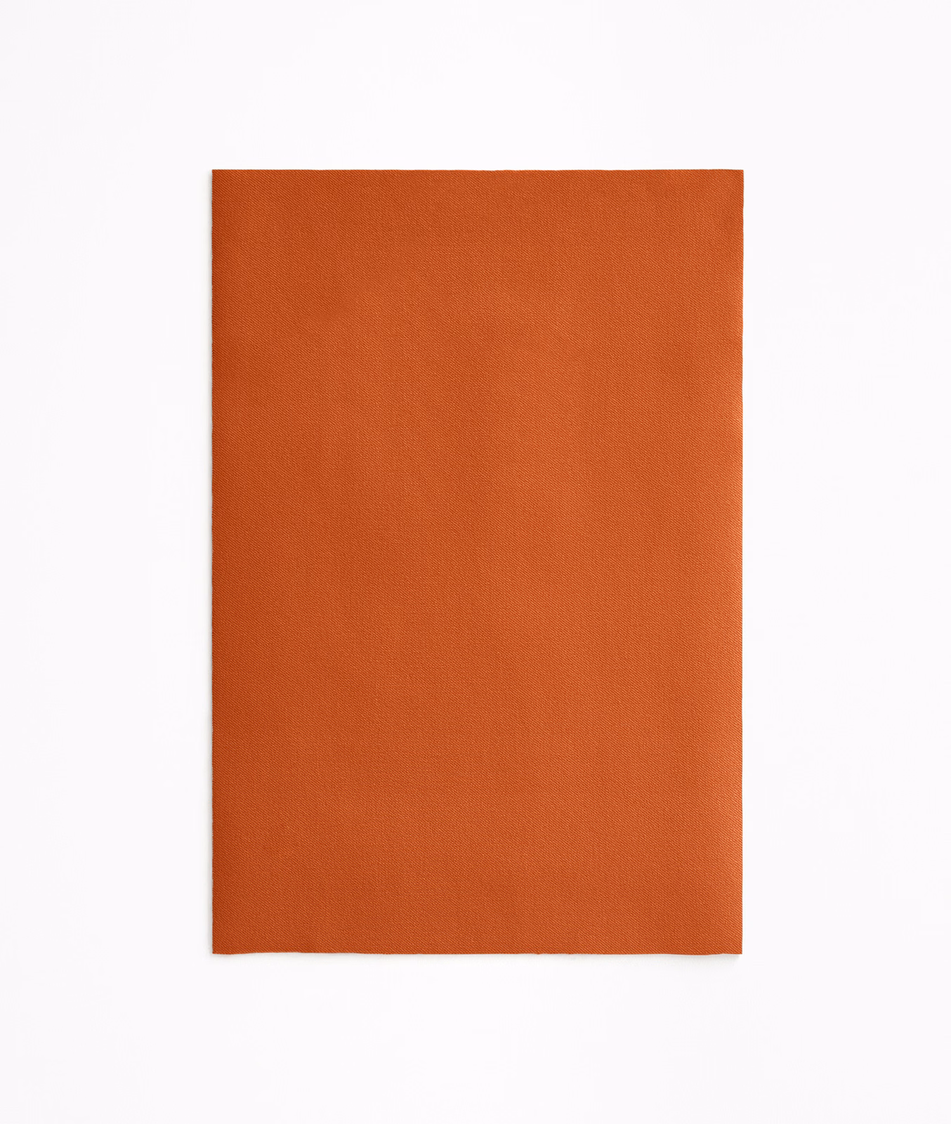 Burnt saffron-orange plain velvet swatch with softly shaded nap