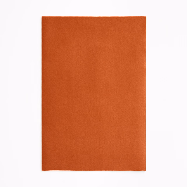 Burnt saffron-orange plain velvet swatch with softly shaded nap