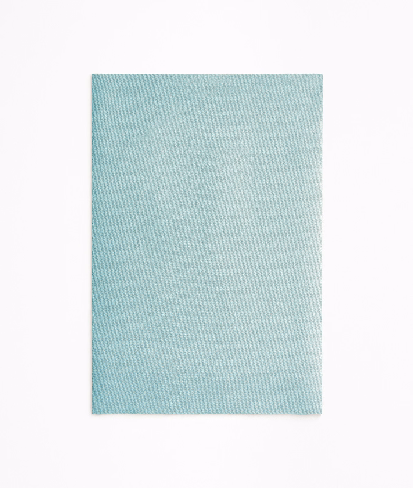 Pale aqua blue velvet swatch with softly shifting nap and plain surface