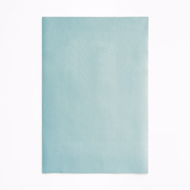 Pale aqua blue velvet swatch with softly shifting nap and plain surface
