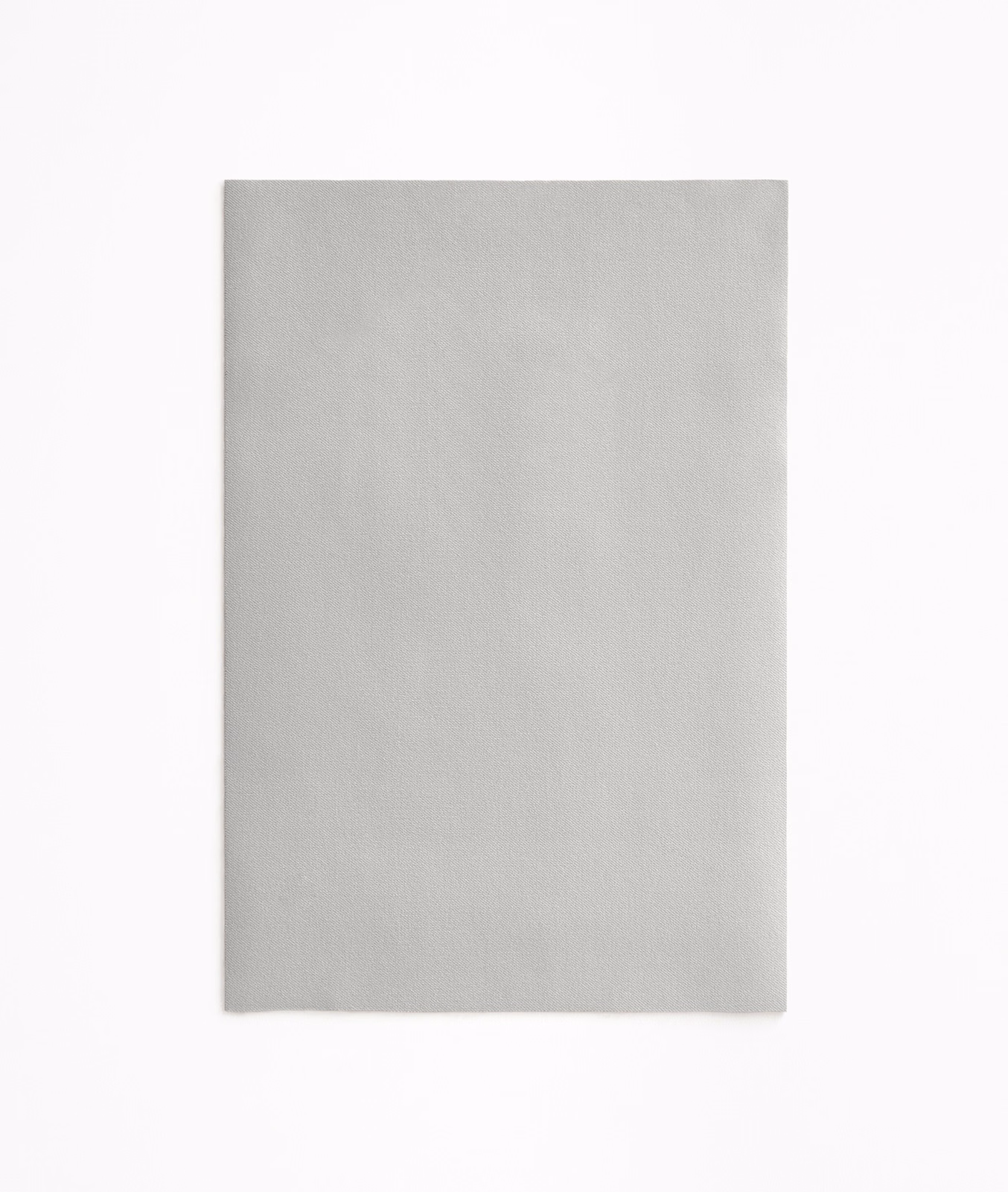 Pale cool-grey velvet swatch with a plain, softly brushed surface