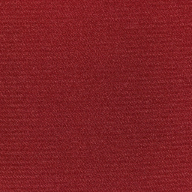 Close-up of deep Bordeaux-red velvet with a softly brushed, subtly shaded surface