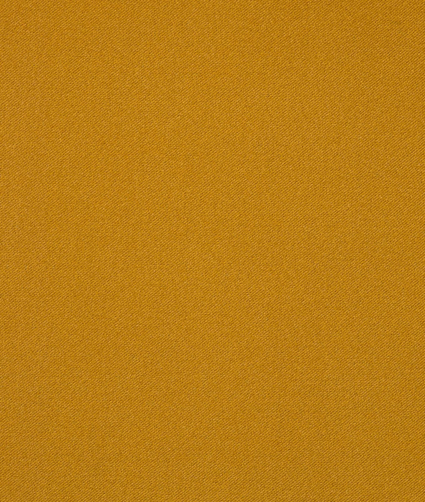 Close-up of warm mustard-yellow velvet with fine, subtly diagonal surface texture