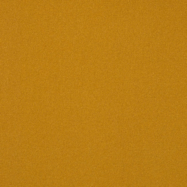 Close-up of warm mustard-yellow velvet with fine, subtly diagonal surface texture