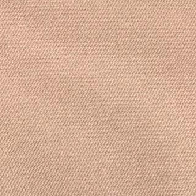 Warm blush-beige velvet swatch showing a fine, softly directional surface texture