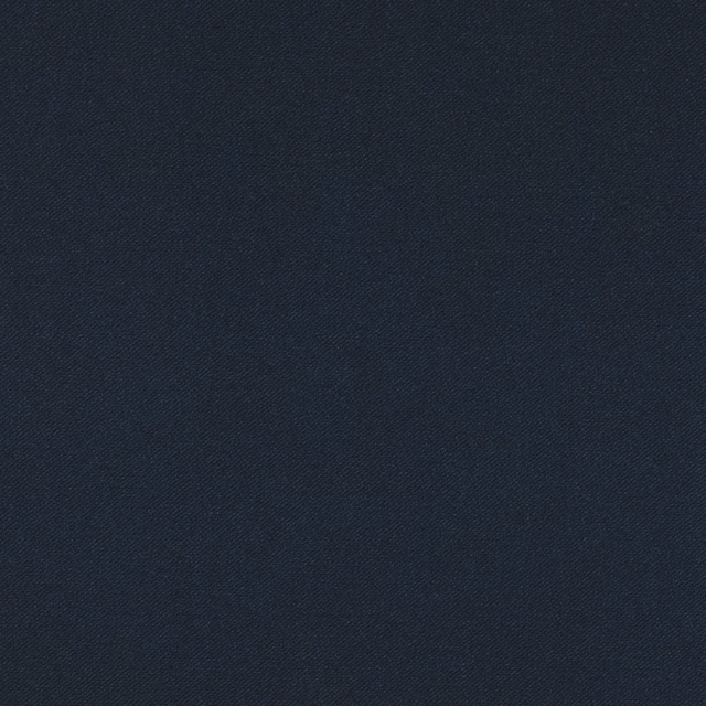 Close-up of dark blue-black velvet with a fine diagonal woven texture