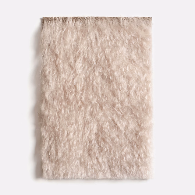 Pale blush-cream Dedar velvet swatch with long, softly rippled shag pile