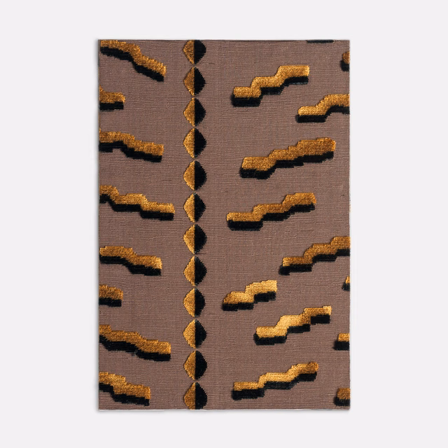 Mauve-taupe velvet with ochre-gold and black stepped geometric motifs