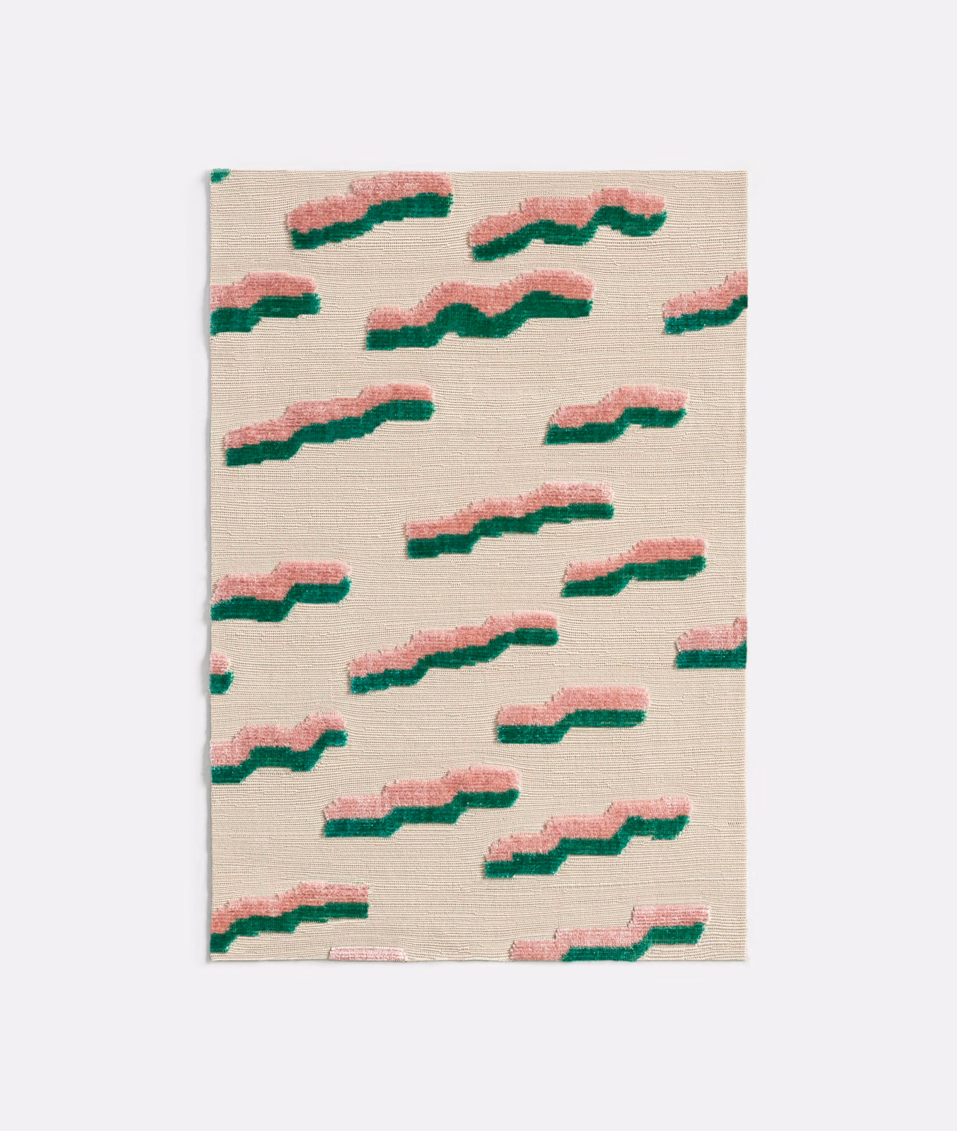 Warm ivory velvet with repeating blush-pink and green undulating woven motifs