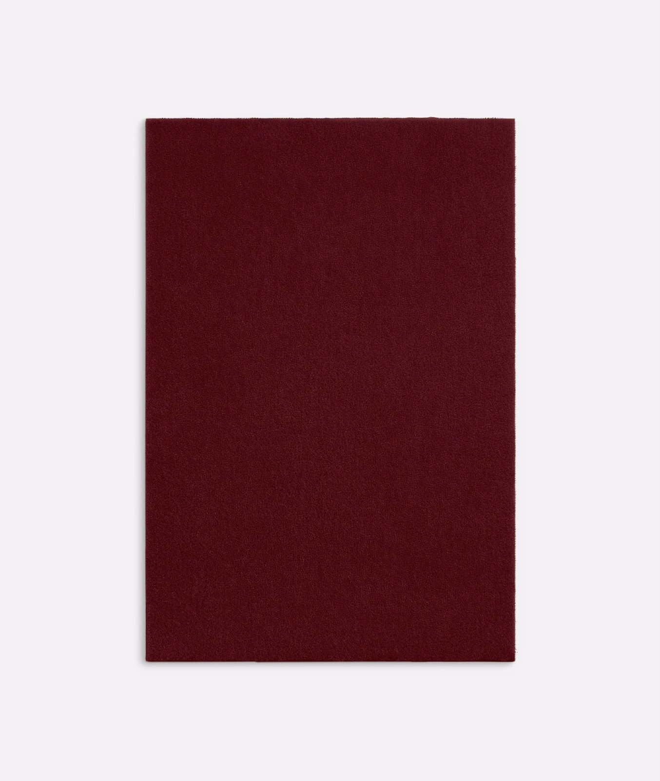 Deep bordeaux velvet swatch with a plain, softly directional pile