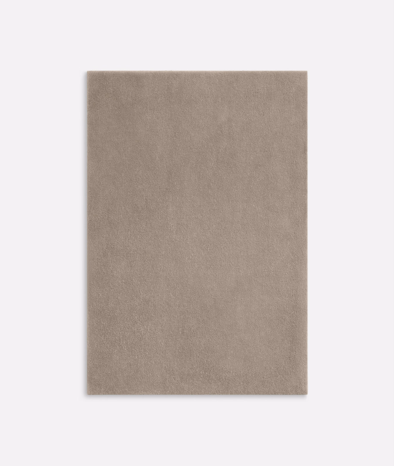 Softly brushed mushroom taupe velvet with an even, unpatterned pile