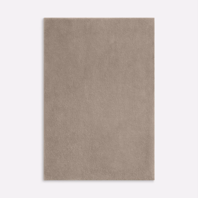 Softly brushed mushroom taupe velvet with an even, unpatterned pile