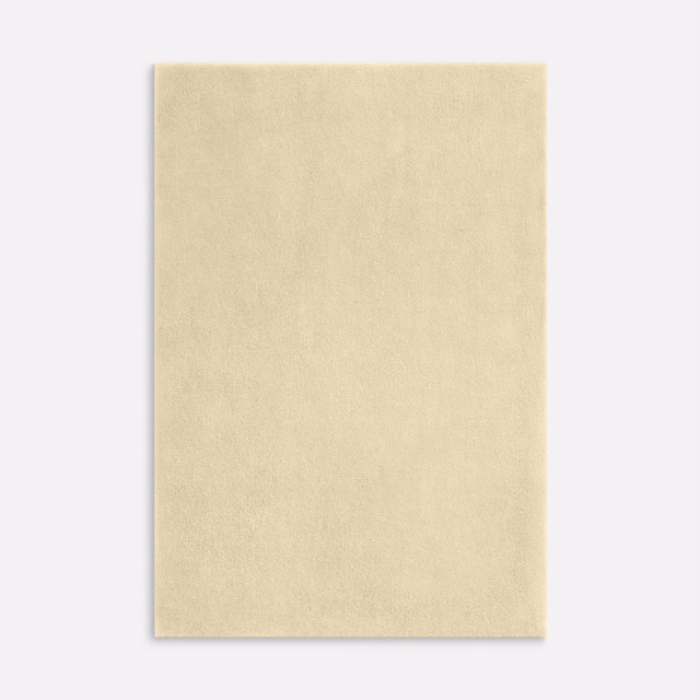 Warm ivory velvet swatch with an even, softly brushed plush texture