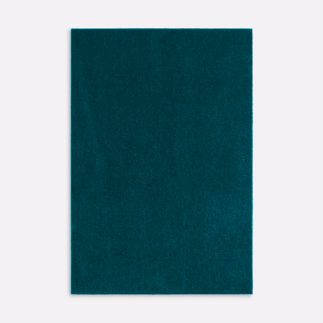 Deep teal velvet swatch showing a soft, subtly directional pile