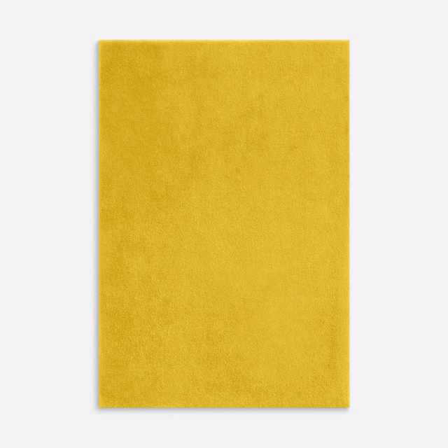 Plain sulphur-yellow velvet swatch with a softly brushed, light-catching pile