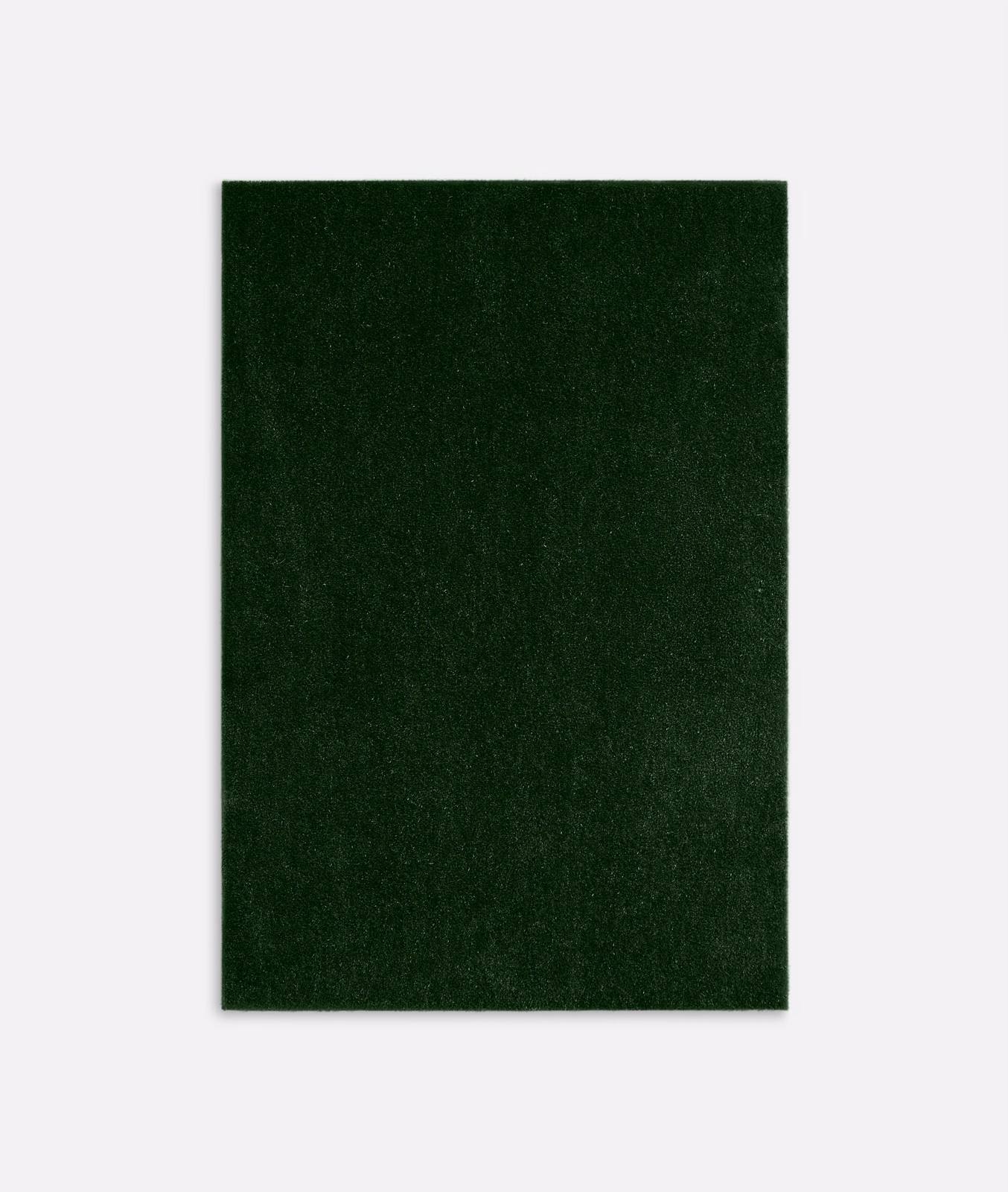 Deep bottle-green velvet swatch showing a dense, subtly varied directional pile