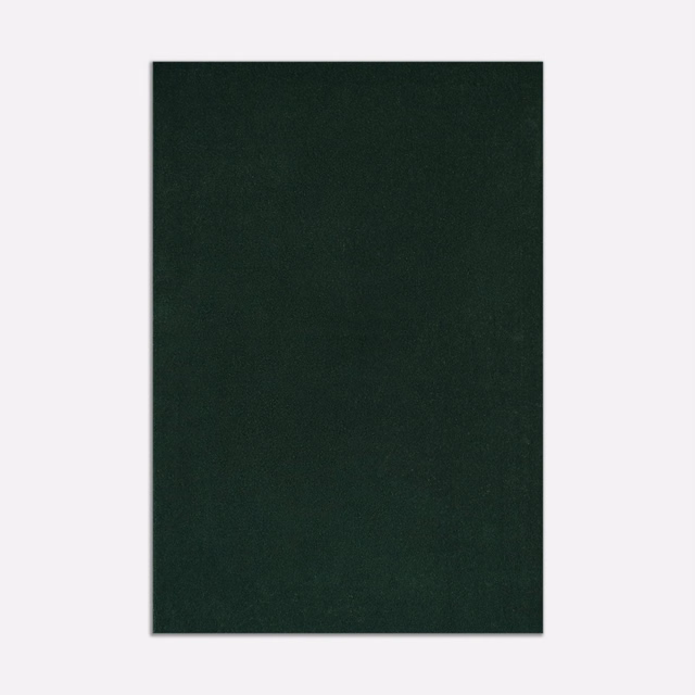 Deep forest-green velvet swatch with a subtly light-catching, even pile