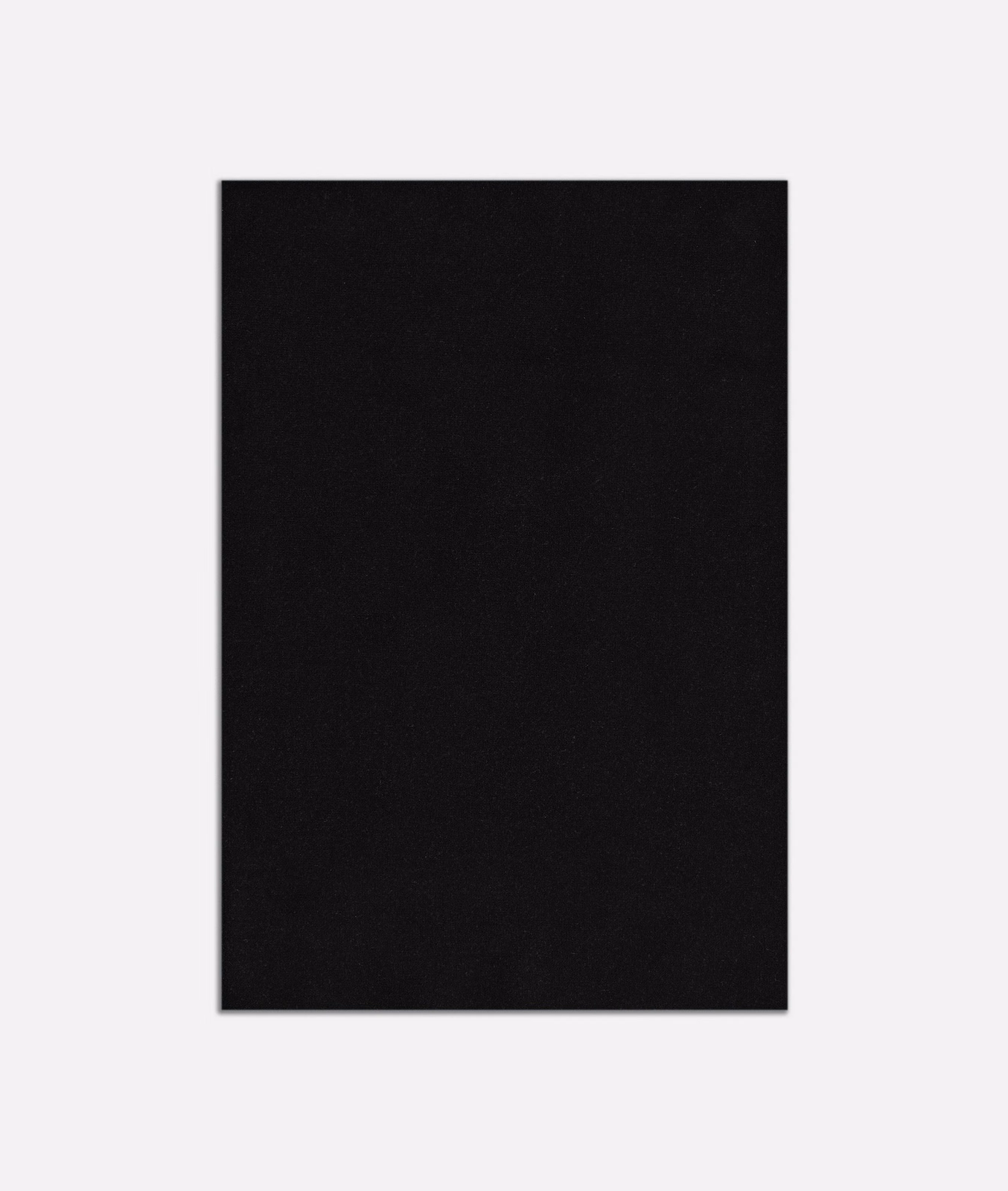 Near-black plain velvet swatch with a softly matt, fine-textured surface