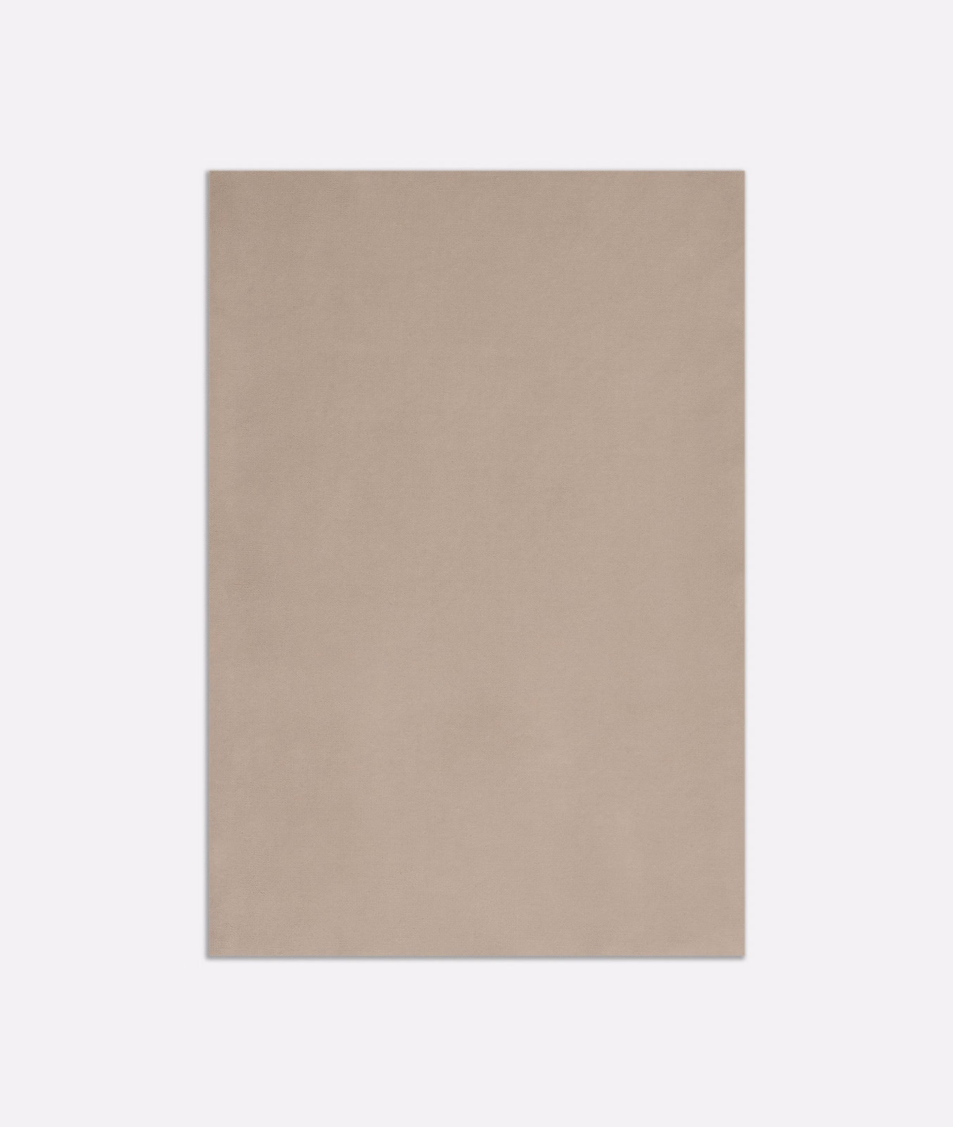 Close view of plain warm sandy taupe velvet with a softly brushed, even nap