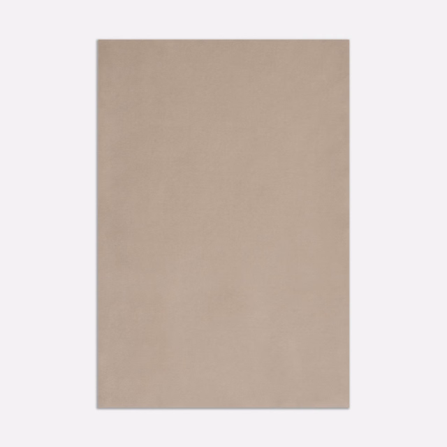 Close view of plain warm sandy taupe velvet with a softly brushed, even nap