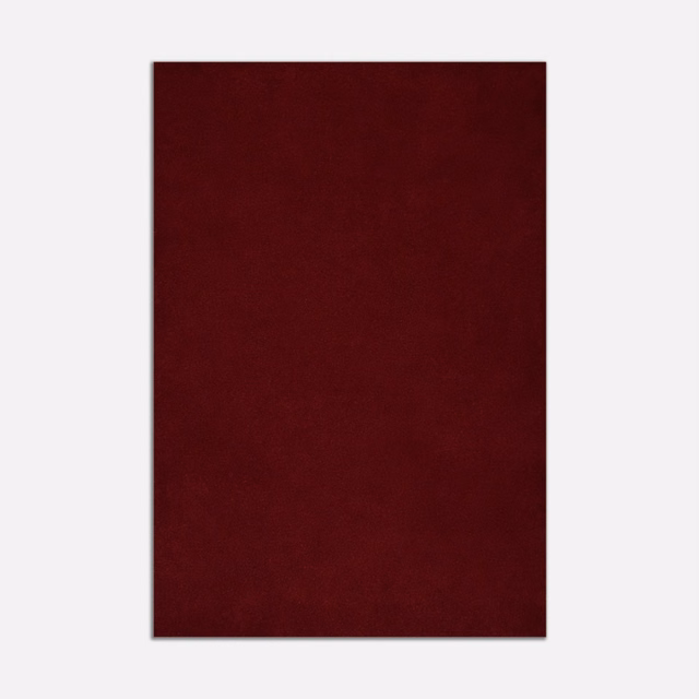 Deep oxblood red velvet swatch with subtle nap variation and a plain surface
