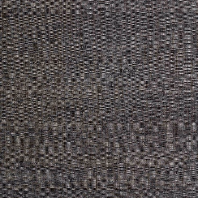 Charcoal-grey Picolit wallpaper with fine taupe crosshatching and a softly mottled surface