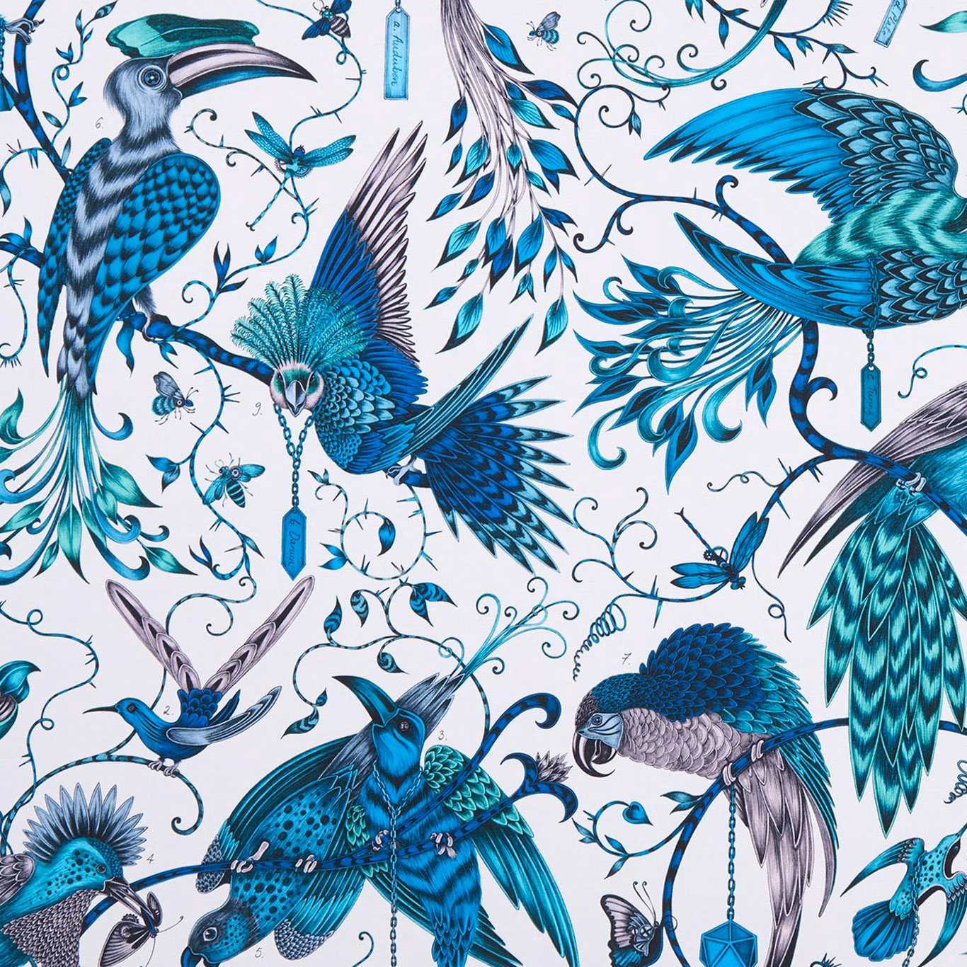 White-ground textile with jewel-toned teal birds, turquoise wings and curling botanical trails