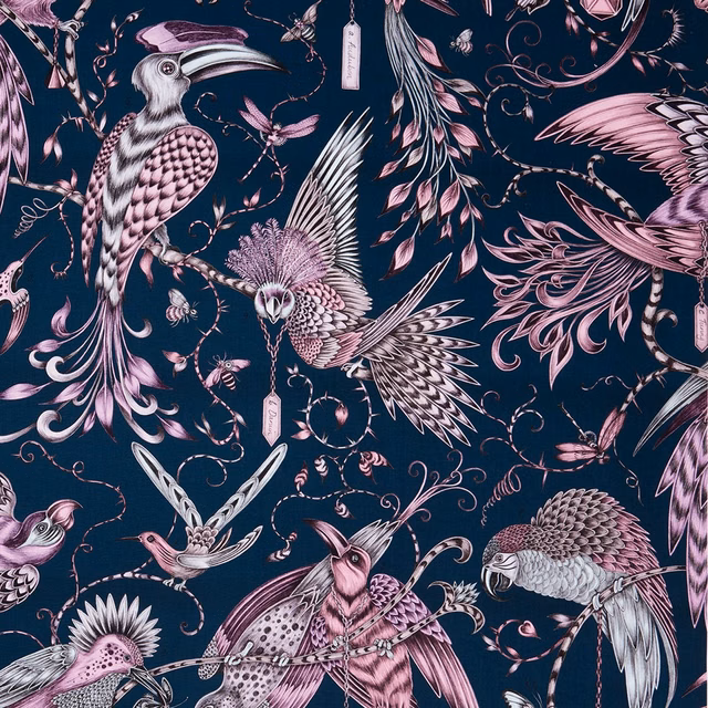 Navy fabric with blush-pink exotic birds, feathers and curling botanical trails