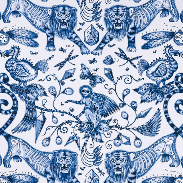 Extinct Blue fabric with navy lions, winged birds and botanical animals on pale ground