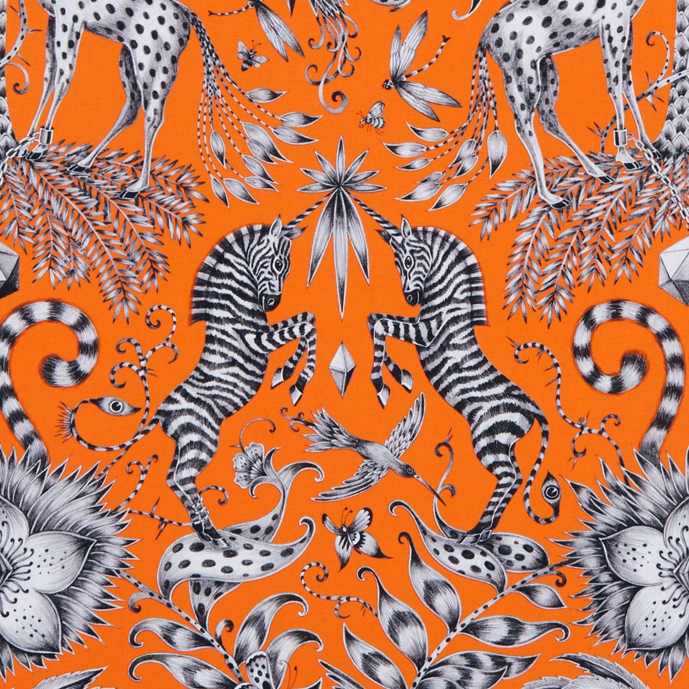 Flame-orange fabric with black-and-white zebras, giraffes, birds and botanical motifs