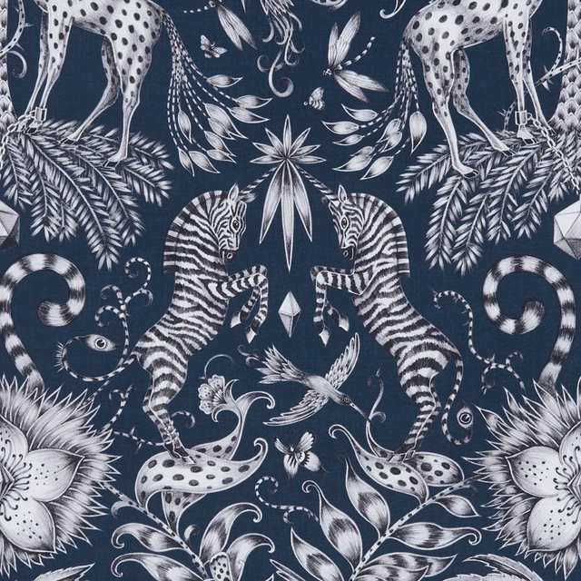 Deep navy fabric with ivory zebras, spotted animals, birds, flowers and foliage