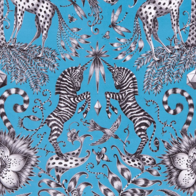Turquoise teal velvet showing black-and-white zebras, spotted leopards and botanical motifs