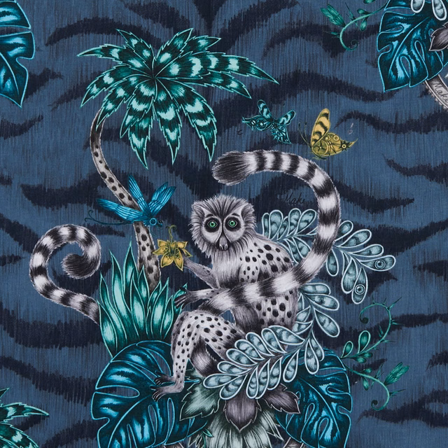 Deep navy ground with teal foliage, spotted lemurs and a yellow butterfly