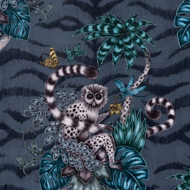 Deep navy velvet with a spotted lemur, teal jungle leaves and curling tails