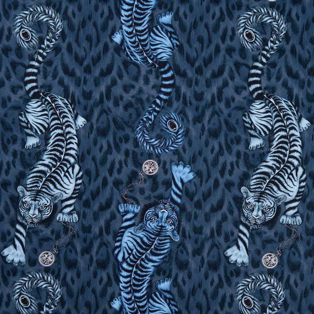 Deep navy fabric with icy blue striped tigers and curling animal motifs