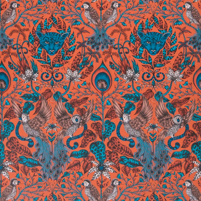 Coral-red wallpaper showing a teal feline, peacocks, birds and dense botanical linework