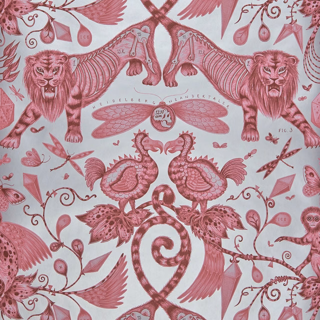 Dusty magenta lions and winged creatures on a pale blush animal wallpaper