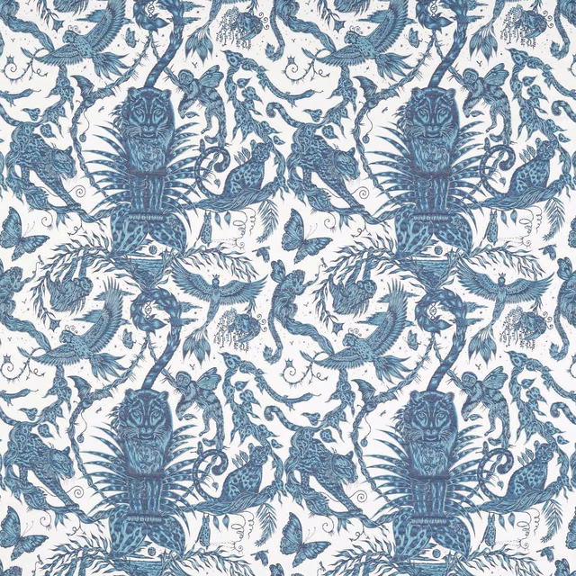Ink-blue birds, big cats and botanical forms woven across an ivory ground