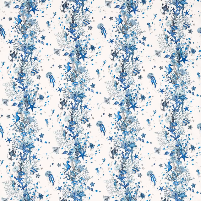 Cool blue coral, fish and starfish pattern on an ivory textile ground