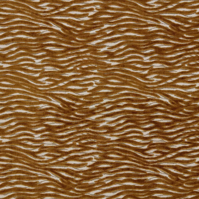 Close-up of warm bronze-brown irregular tiger stripes woven over a pale ground