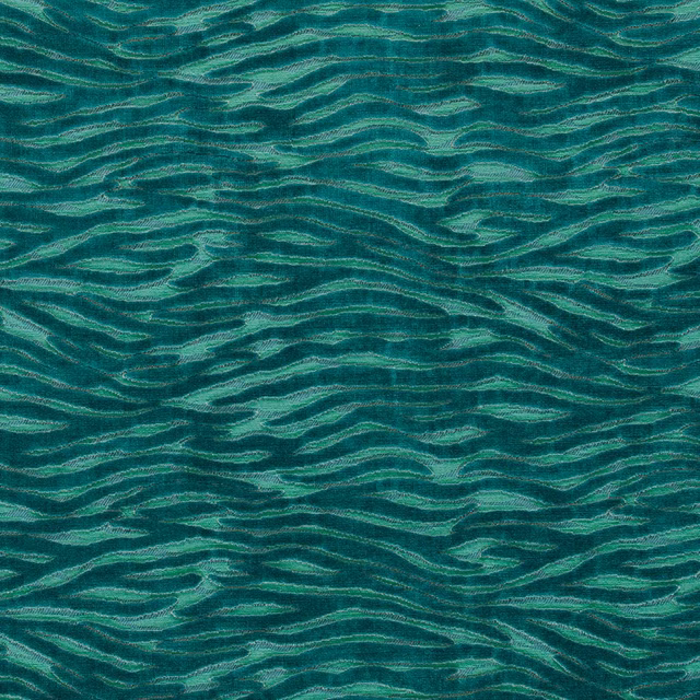 Deep teal woven upholstery with seafoam rippling stripes and tactile highlights