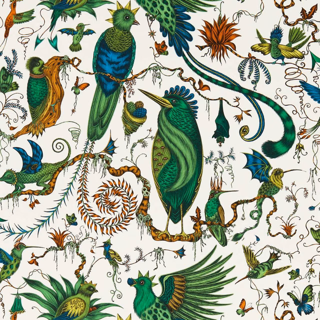 Emerald and teal birds, curling vines and orange botanical motifs on an ivory ground
