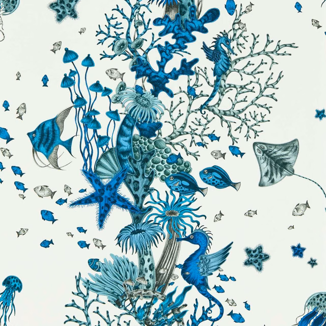 Blue and teal seahorses, coral, fish and starfish on a cream ground