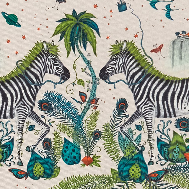 Ivory fabric showing green zebras, teal peacocks, palms and botanical jungle motifs